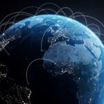 Globo terráqueo con conexiones luminosas que representan las cadenas de suministro internacionales y el nearshoring